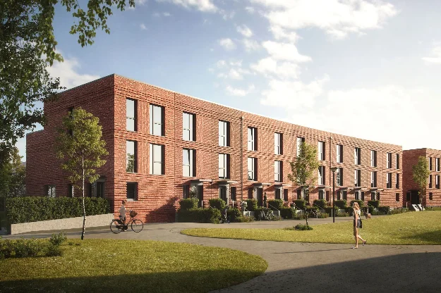 Visualisierung der UP TOWN HOUSES in der Neuen Meile. Vom Park aus sind schräg vorn rechts die Eingangseiten der Townhouses zu sehen.