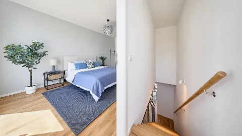 Schlafzimmer links geradeaus die Treppe nach unten des Musterhauses in UP TOWN Houses.